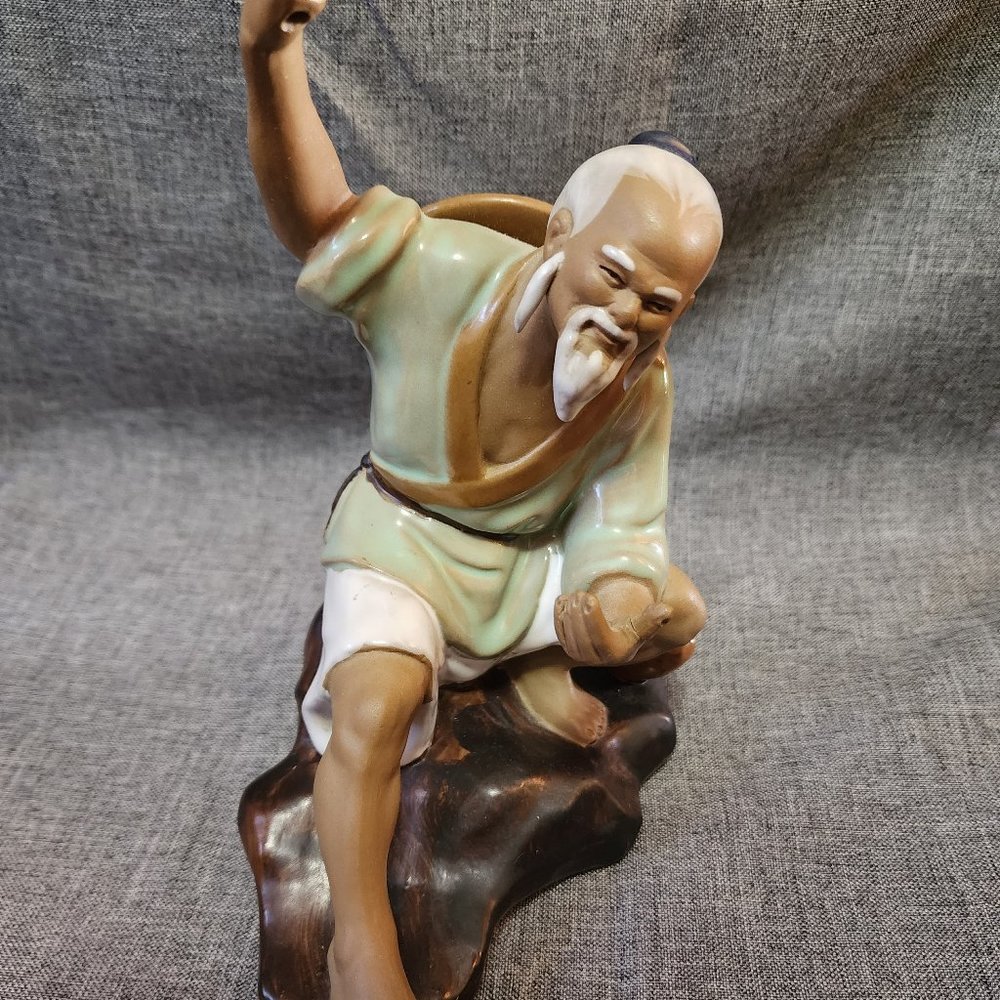 Chinese Glazed Ceramic Mudman Large Sitting On Rock